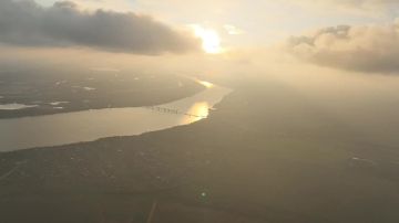 С высоты птичьего парения, Херсон утопает в багрянце заката