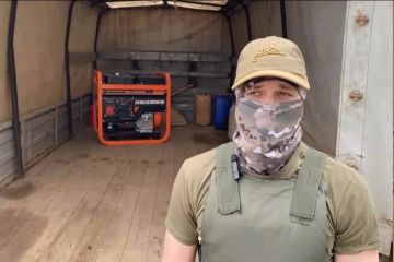 Генератор и 10 биноклей передали бойцам группировки «Днепр»